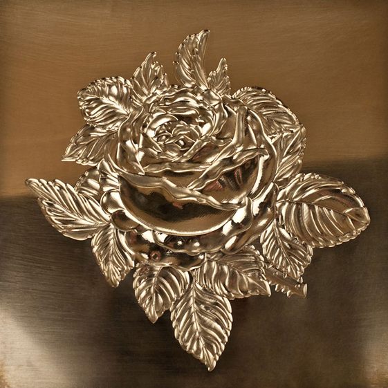 An embossed gold medallion